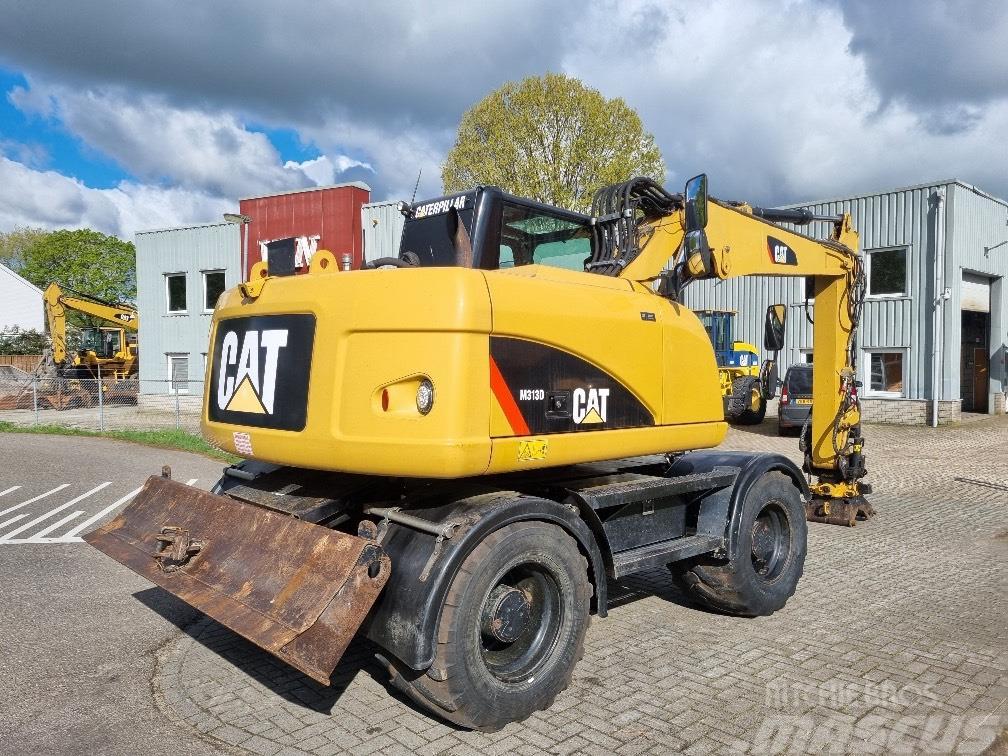 CAT M313D Engcon Wheeled excavators