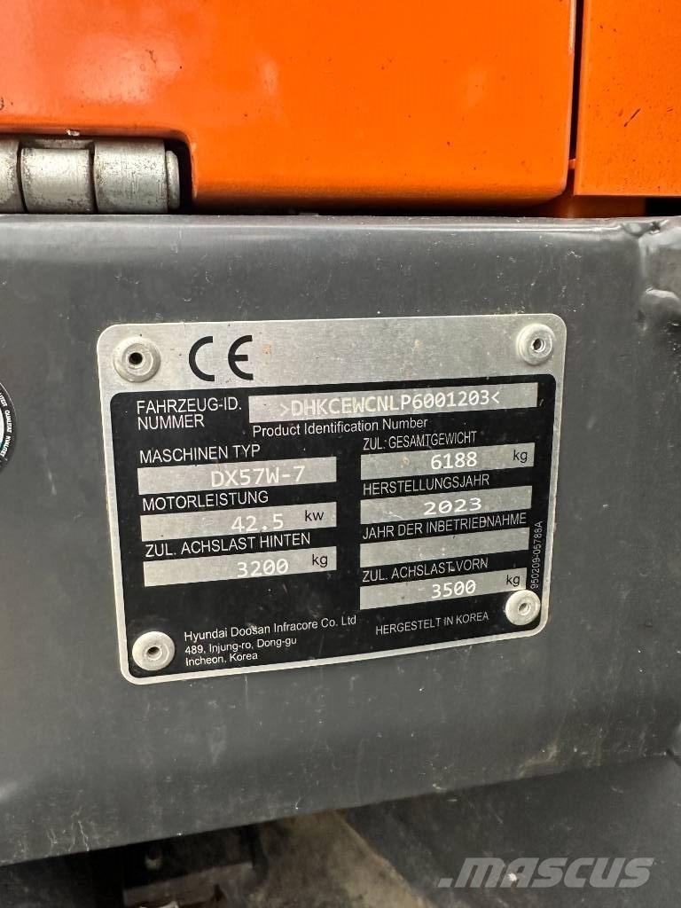 Develon DX 57 W-7 Lastik tekerli ekskavatörler