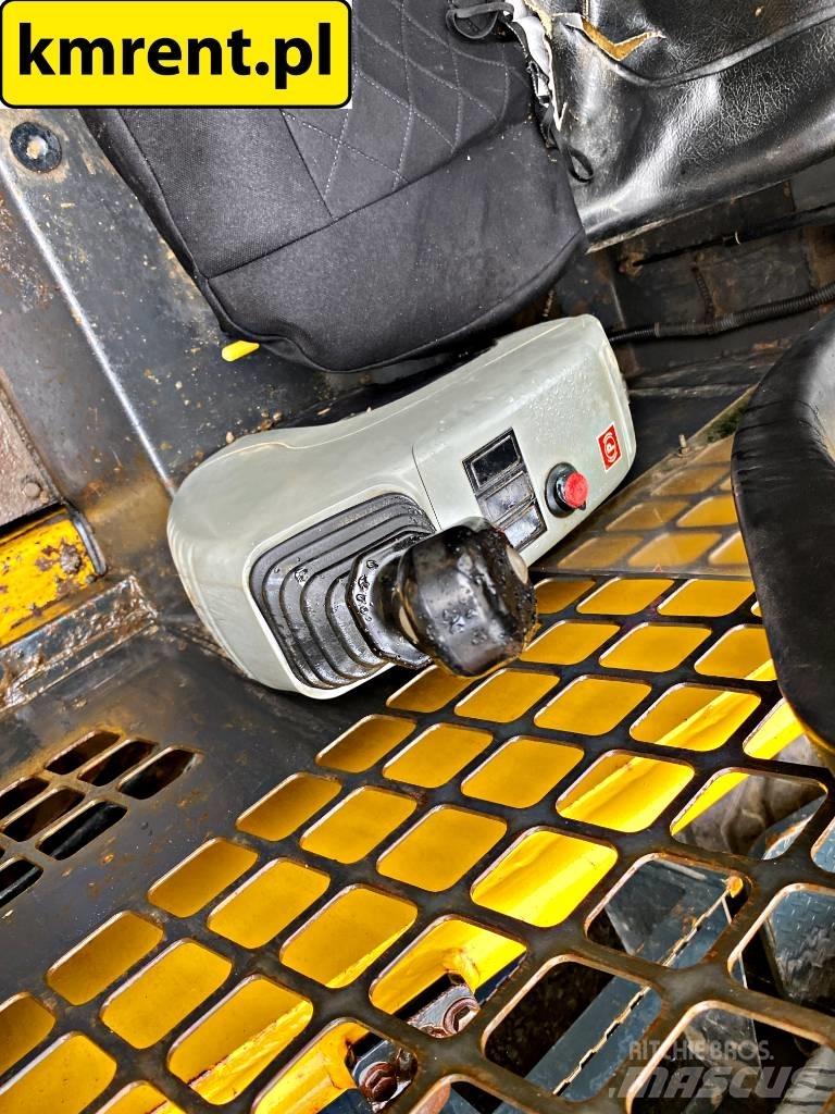 Komatsu SK 815 Skid steer loderler