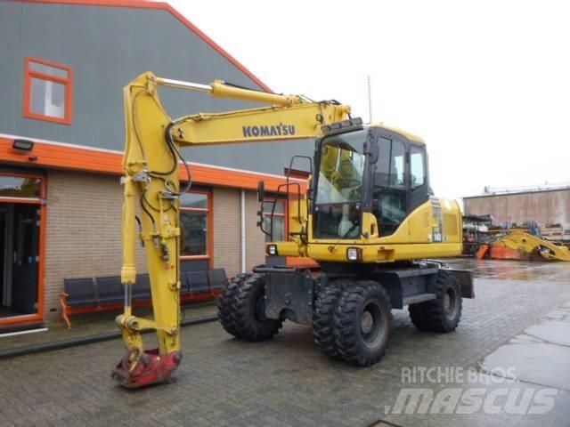 Komatsu PW 140-7 Lastik tekerli ekskavatörler