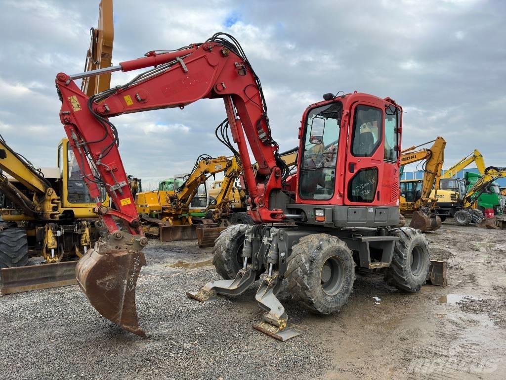 Komatsu PW98MR-8 Lastik tekerli ekskavatörler