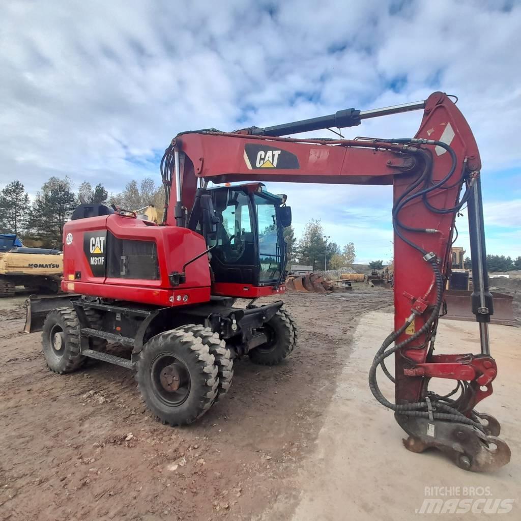 CAT M317 Lastik tekerli ekskavatörler