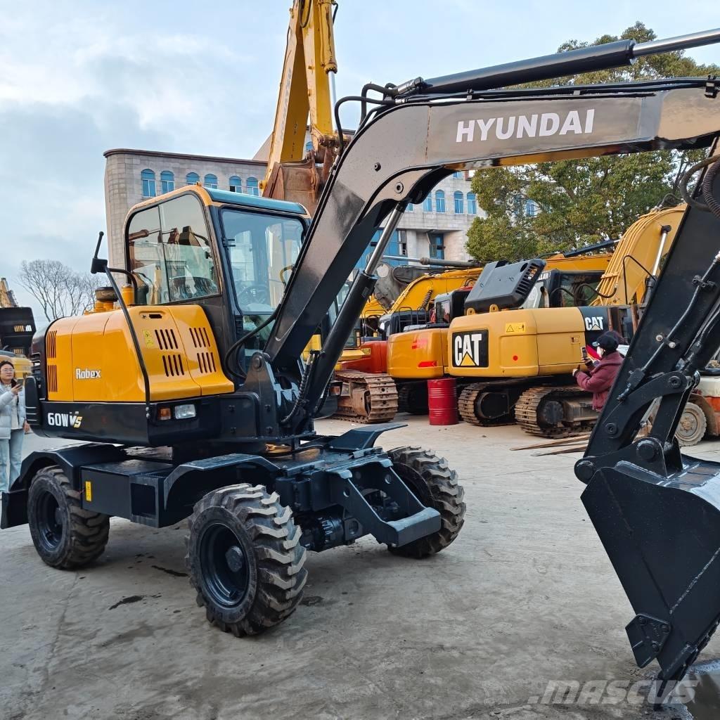 Hyundai 60 W VS Lastik tekerli ekskavatörler