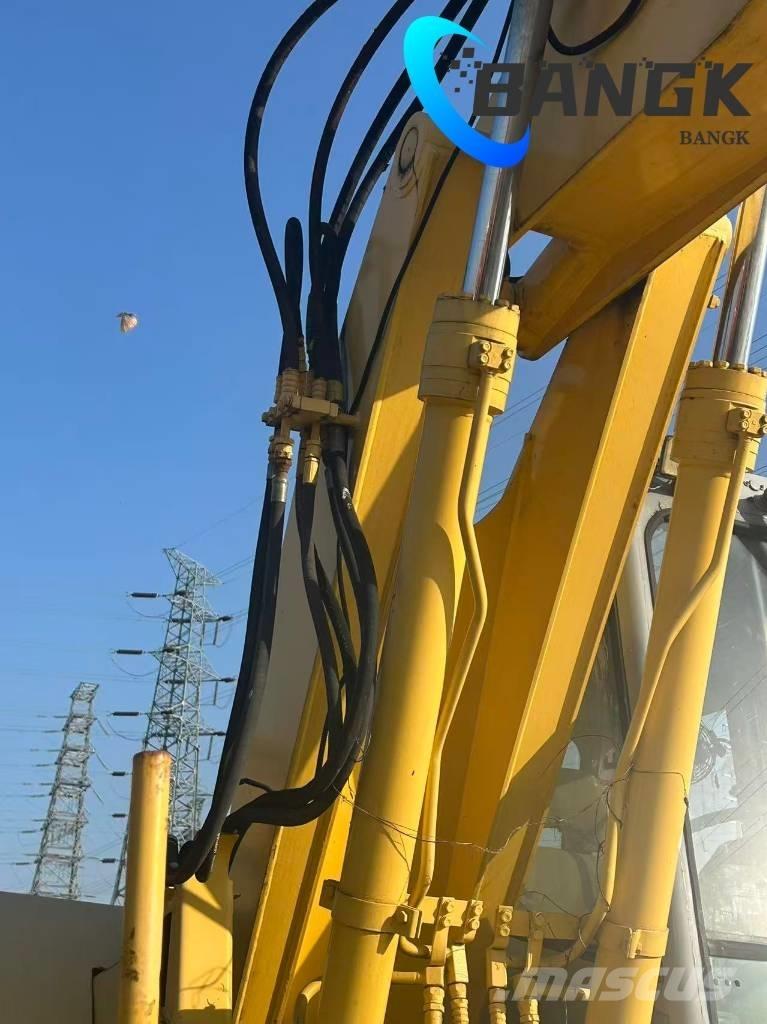  KOMΛ1'SU PW128us Lastik tekerli ekskavatörler