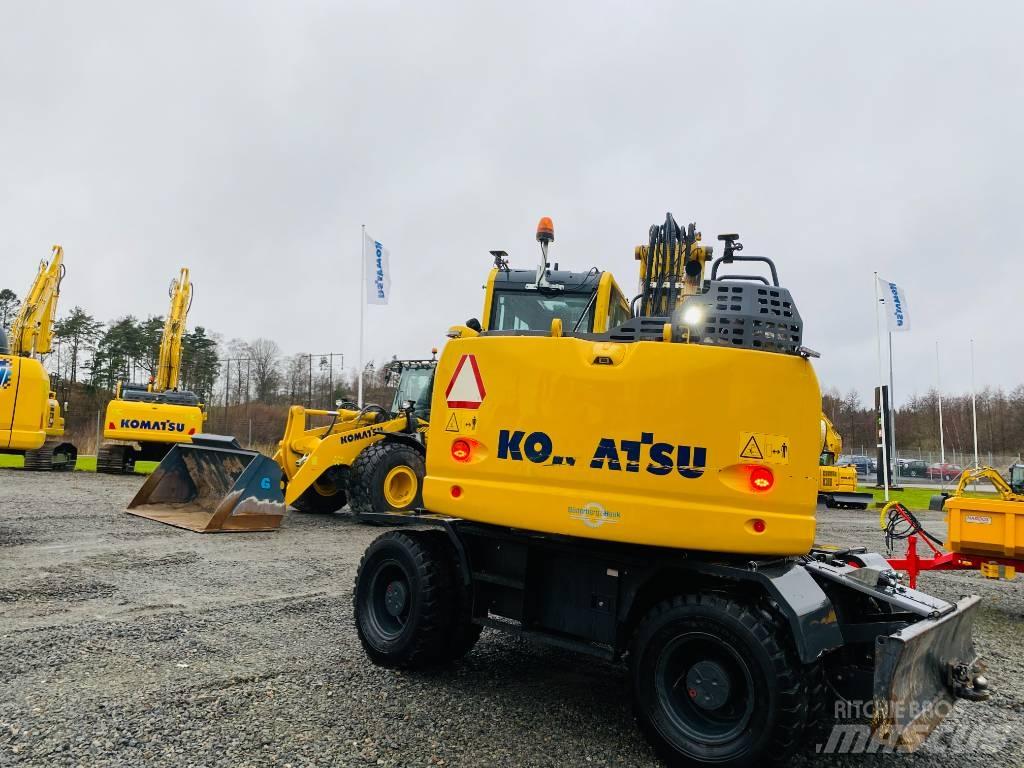 Komatsu PW148-11 Lastik tekerli ekskavatörler