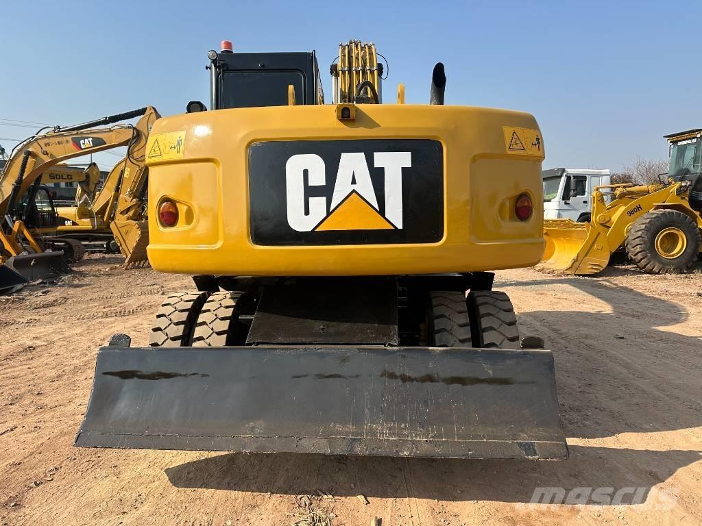CAT M 320D Lastik tekerli ekskavatörler