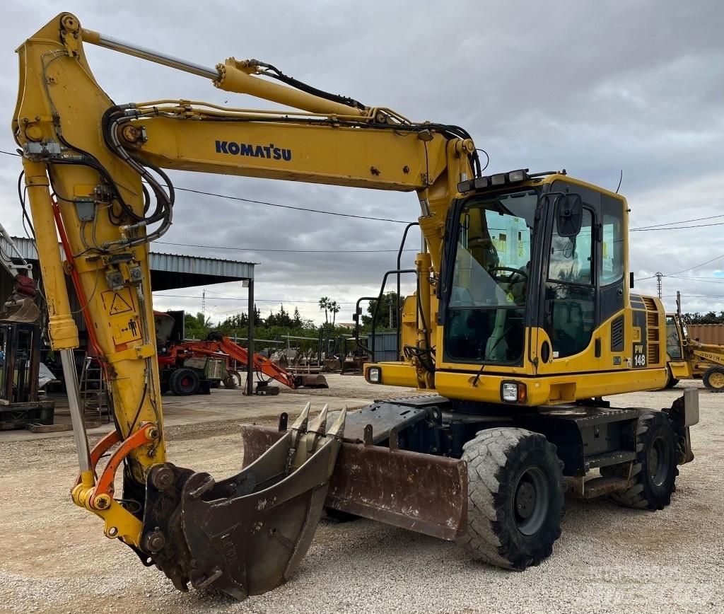 Komatsu PW148-8 Lastik tekerli ekskavatörler