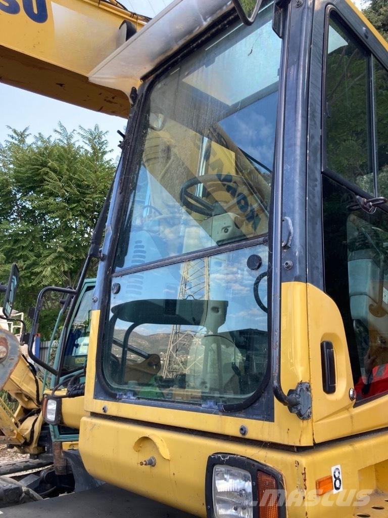 Komatsu PW 140-7 Lastik tekerli ekskavatörler