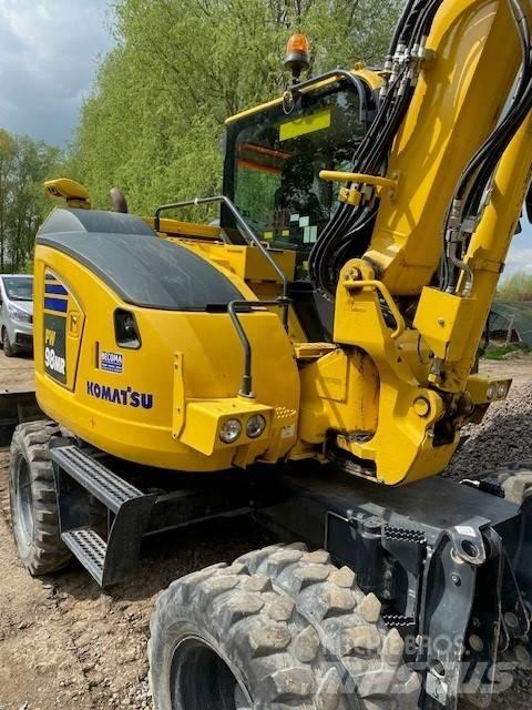 Komatsu PW98MR-11 Lastik tekerli ekskavatörler