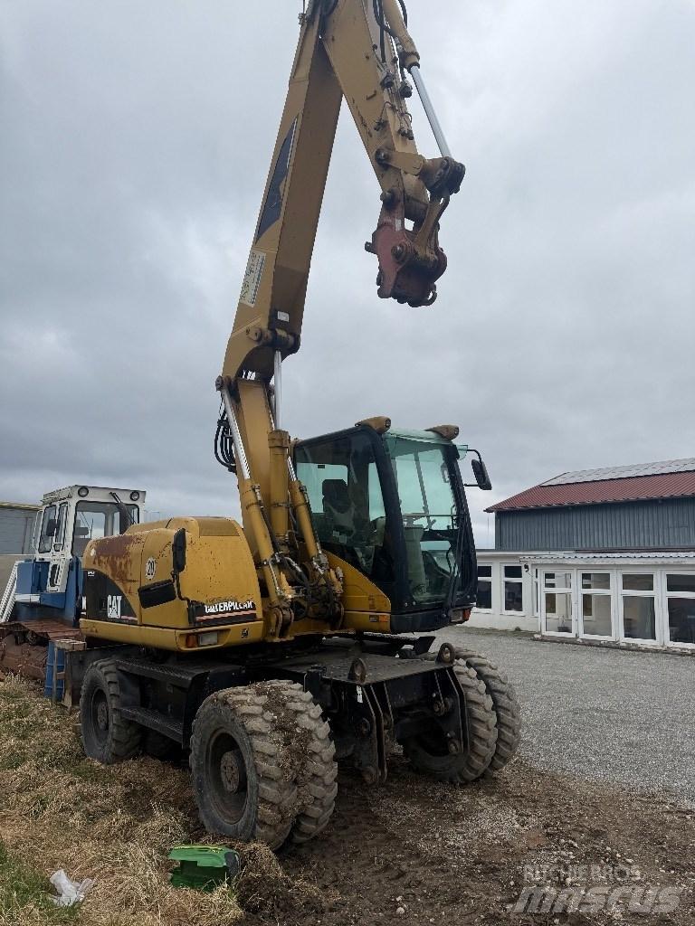 CAT M 313 C Lastik tekerli ekskavatörler