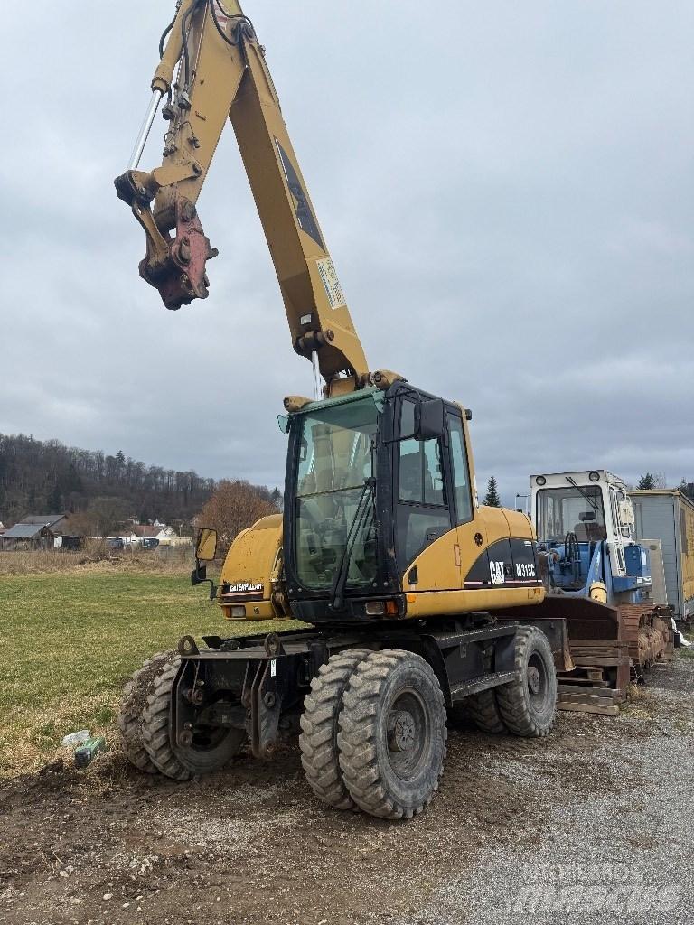 CAT M 313 C Lastik tekerli ekskavatörler