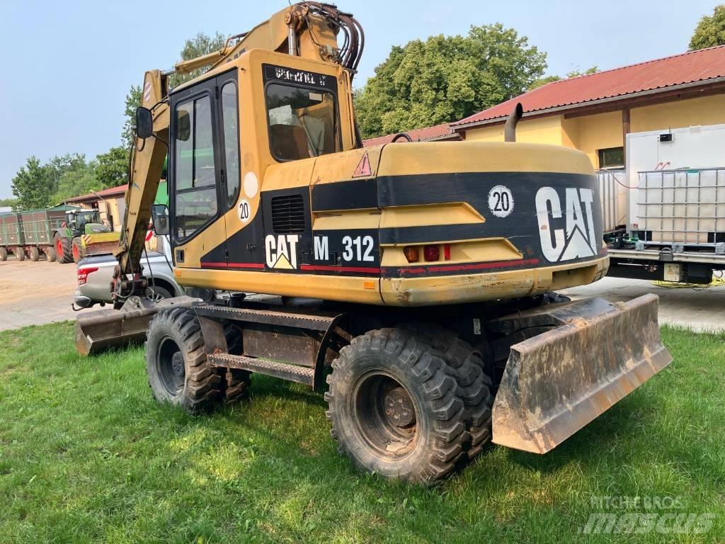 CAT M 312 Lastik tekerli ekskavatörler