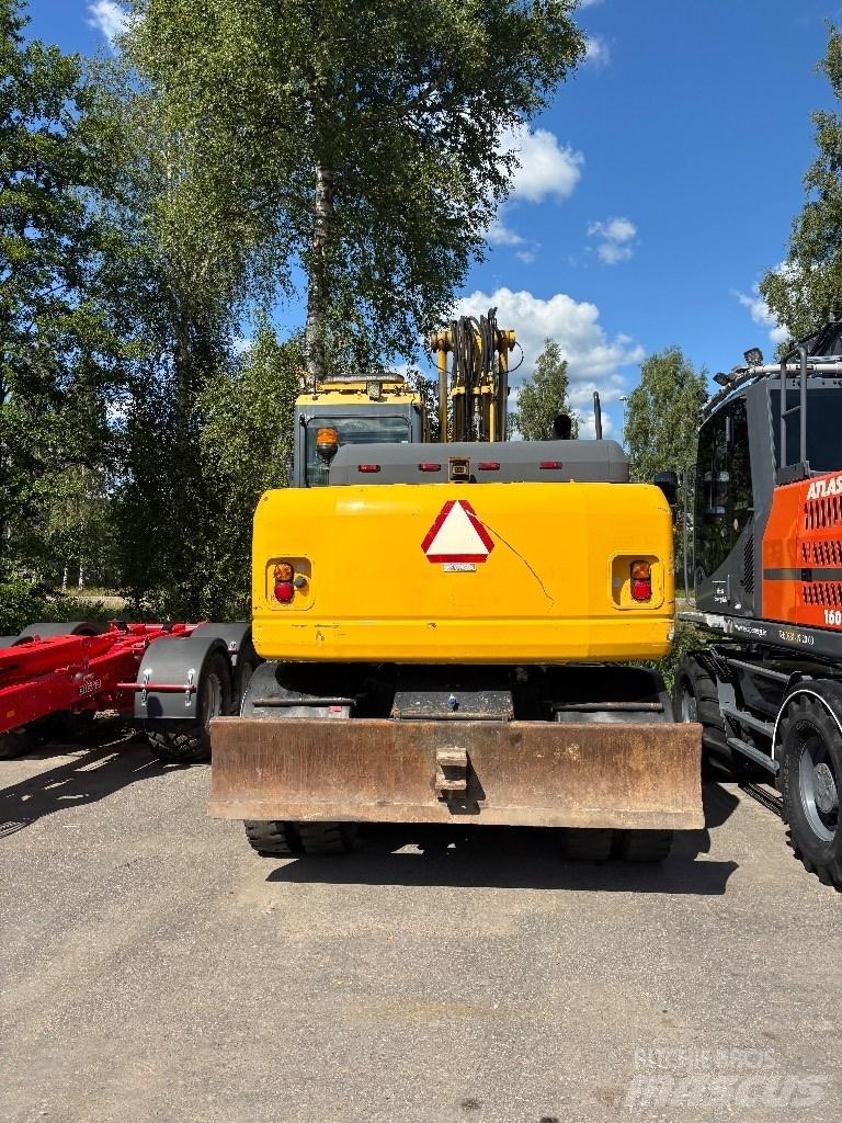 Komatsu PW 140-7 Lastik tekerli ekskavatörler