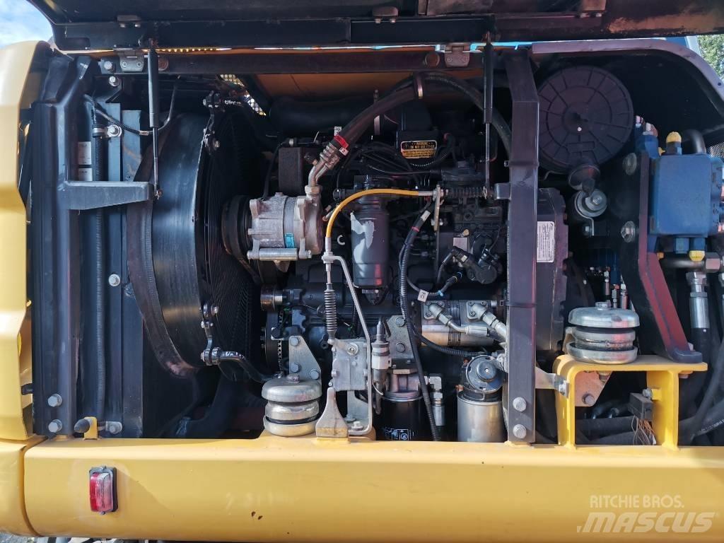 New Holland MH 2.6 Lastik tekerli ekskavatörler