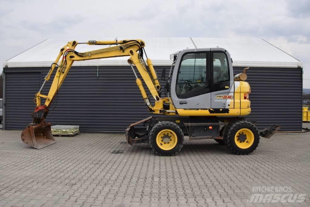New Holland MH 2.6 Lastik tekerli ekskavatörler