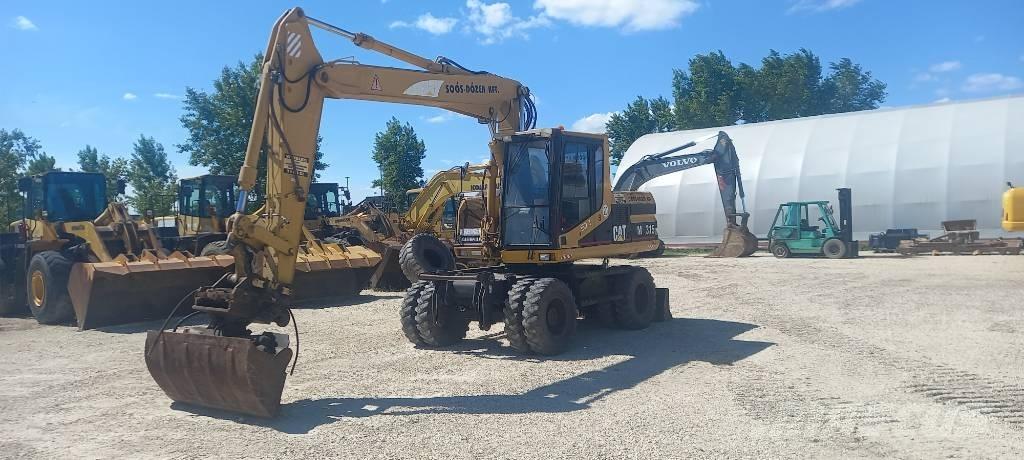 CAT M 315 Lastik tekerli ekskavatörler