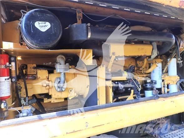 CAT M320 Lastik tekerli ekskavatörler