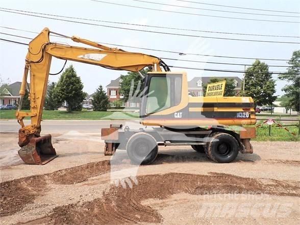 CAT M320 Lastik tekerli ekskavatörler