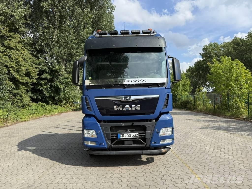 MAN TGX 33.500 Orman makinesi taşıma kamyonları