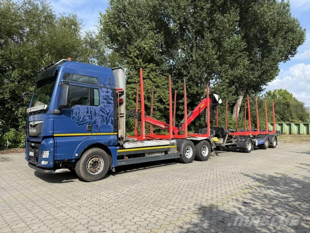 MAN TGX 33.500 Orman makinesi taşıma kamyonları
