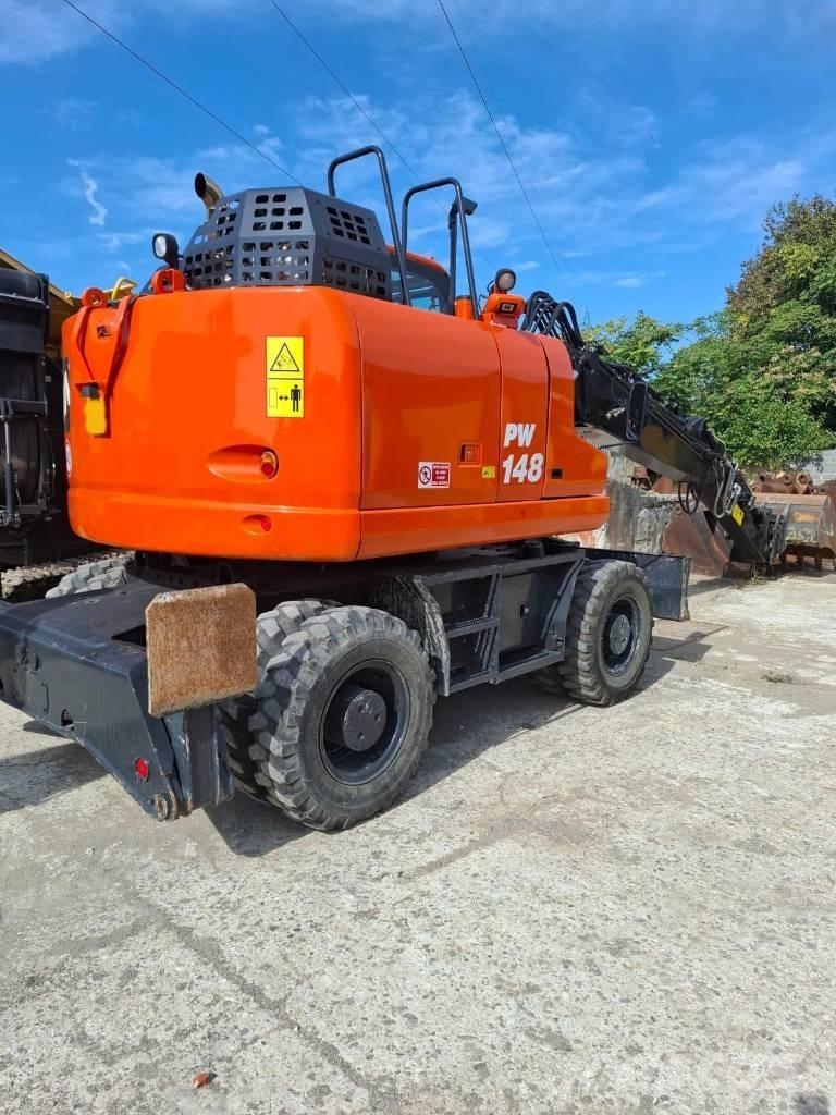 Komatsu PW 148-11 Lastik tekerli ekskavatörler