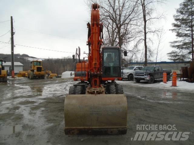 Doosan DX 140 W-3 Lastik tekerli ekskavatörler