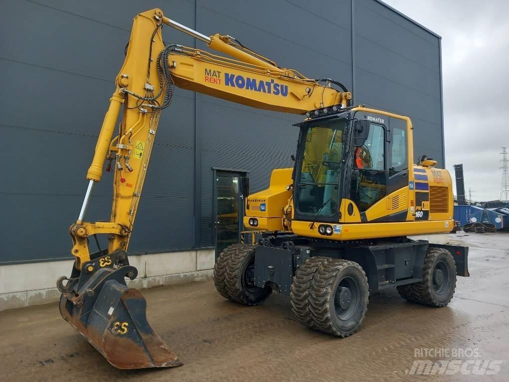 Komatsu PW180-11E0 Lastik tekerli ekskavatörler