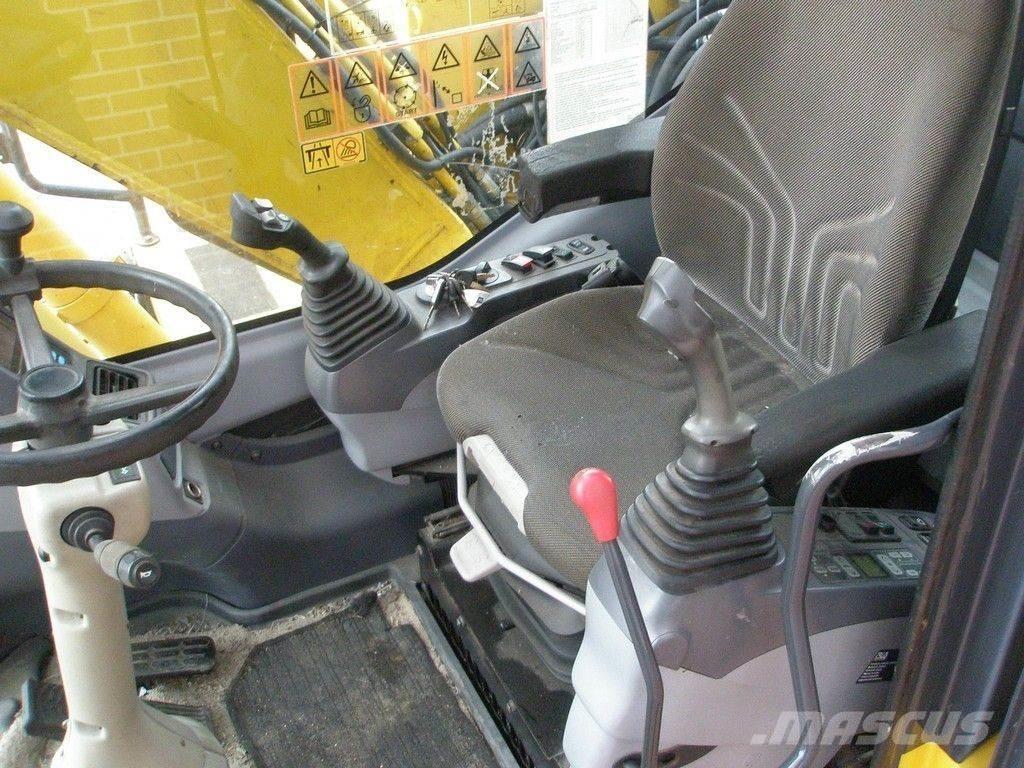 Komatsu PW140-7 Lastik tekerli ekskavatörler