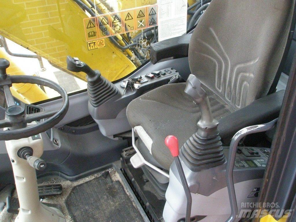 Komatsu PW140-7 Lastik tekerli ekskavatörler