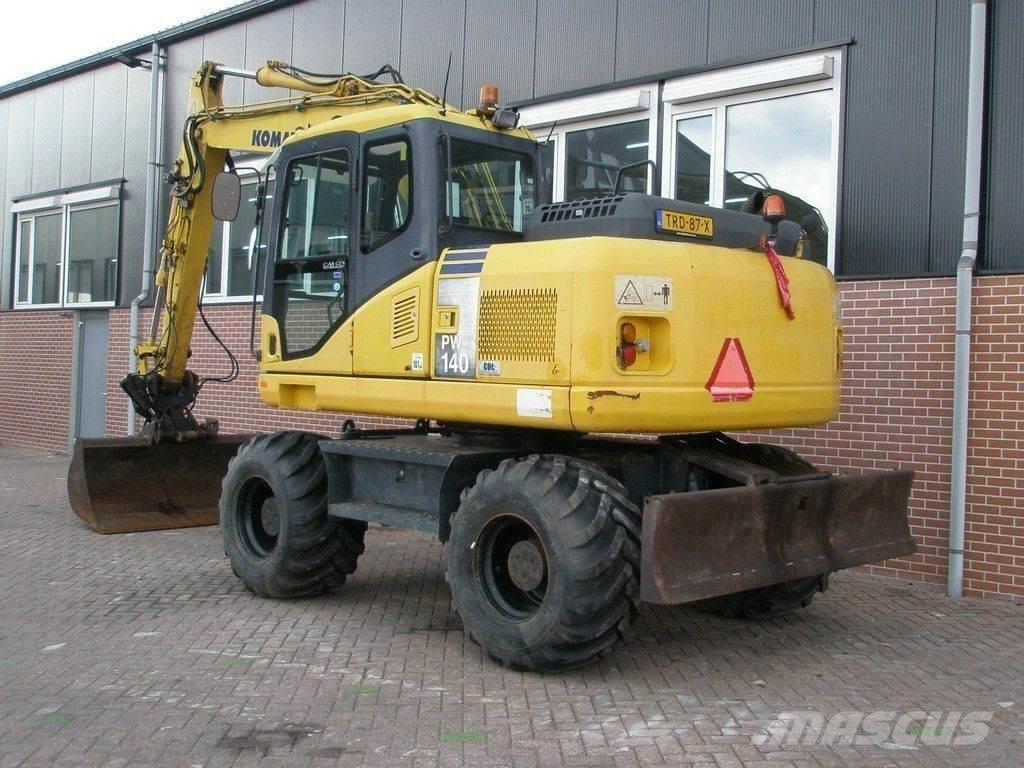 Komatsu PW140-7 Lastik tekerli ekskavatörler