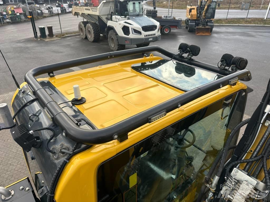 Komatsu PW 148-11 Lastik tekerli ekskavatörler