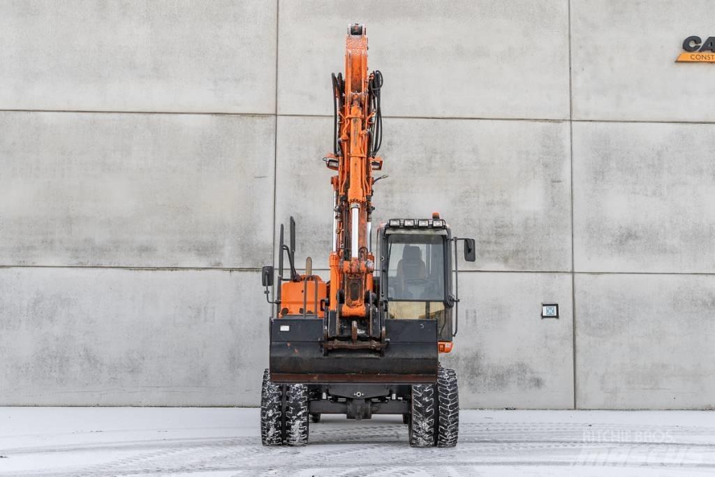 Doosan DX 140 W-3 Lastik tekerli ekskavatörler