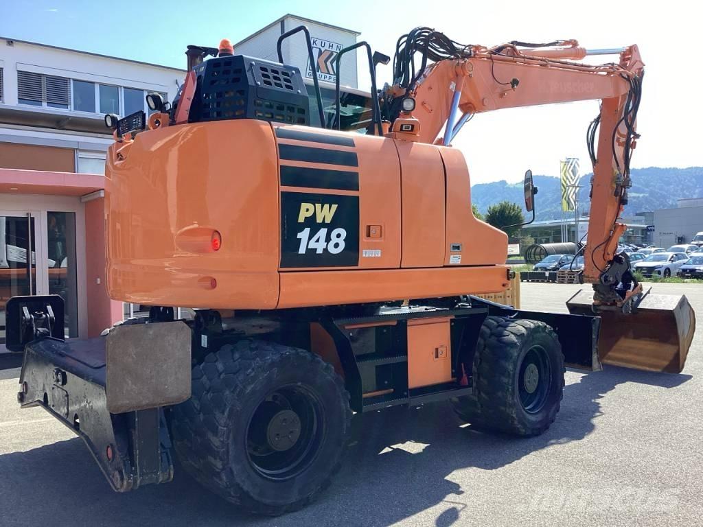 Komatsu PW 148-11 Lastik tekerli ekskavatörler