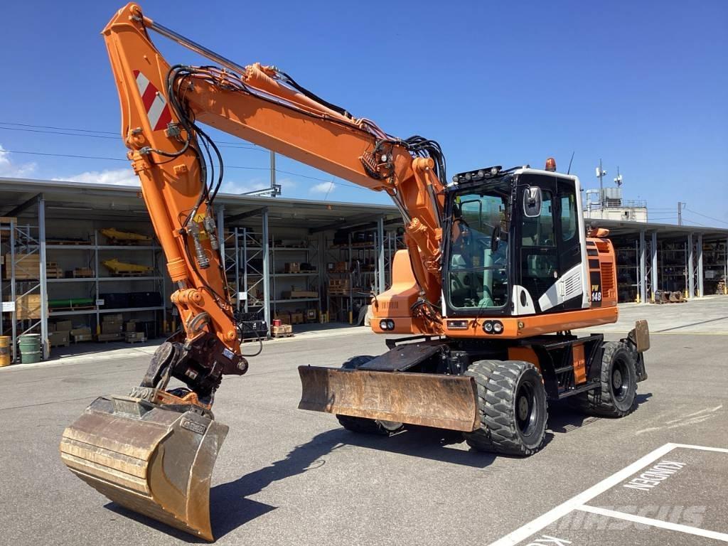 Komatsu PW 148-11 Lastik tekerli ekskavatörler