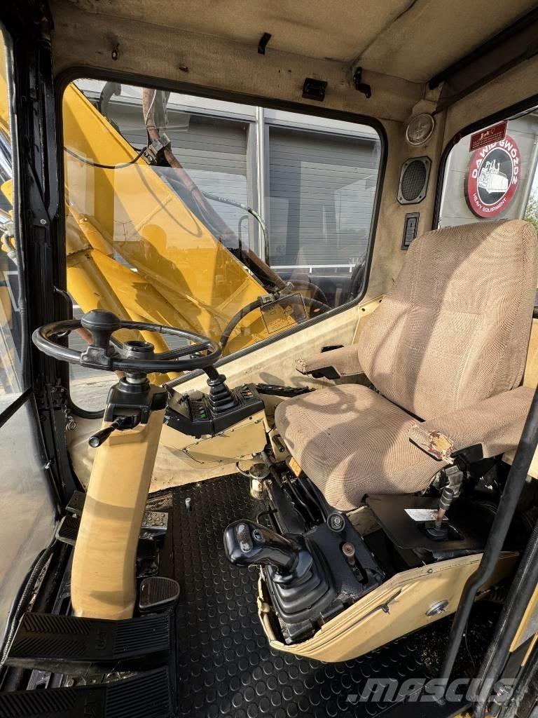 CAT M 315 Lastik tekerli ekskavatörler