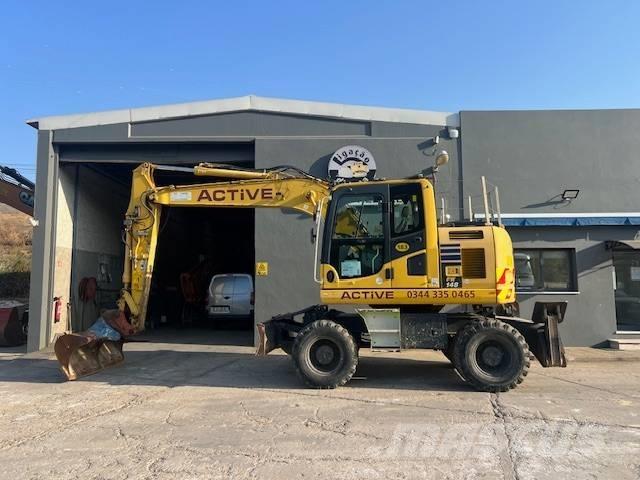 Komatsu PW 148 Lastik tekerli ekskavatörler