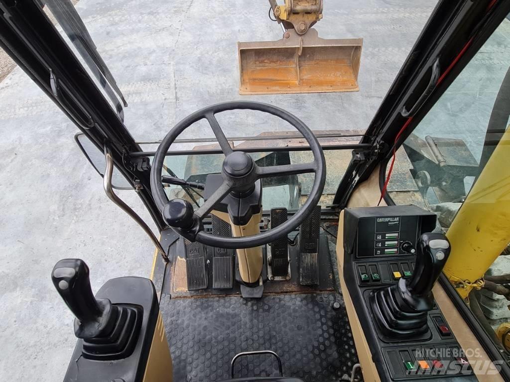 CAT M 312 Lastik tekerli ekskavatörler