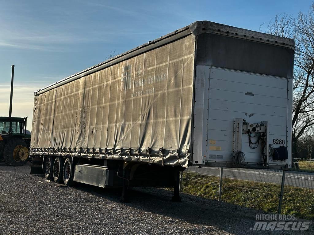 Schmitz SCS 24 L Kayar tenteli çekiciler