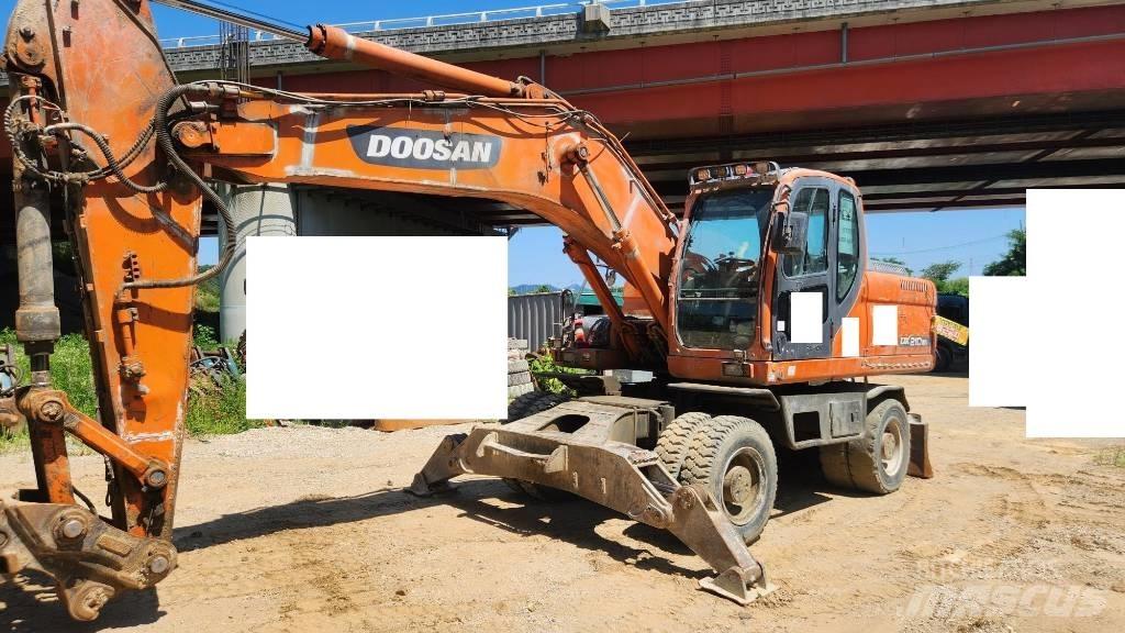 Doosan DX210WA Lastik tekerli ekskavatörler