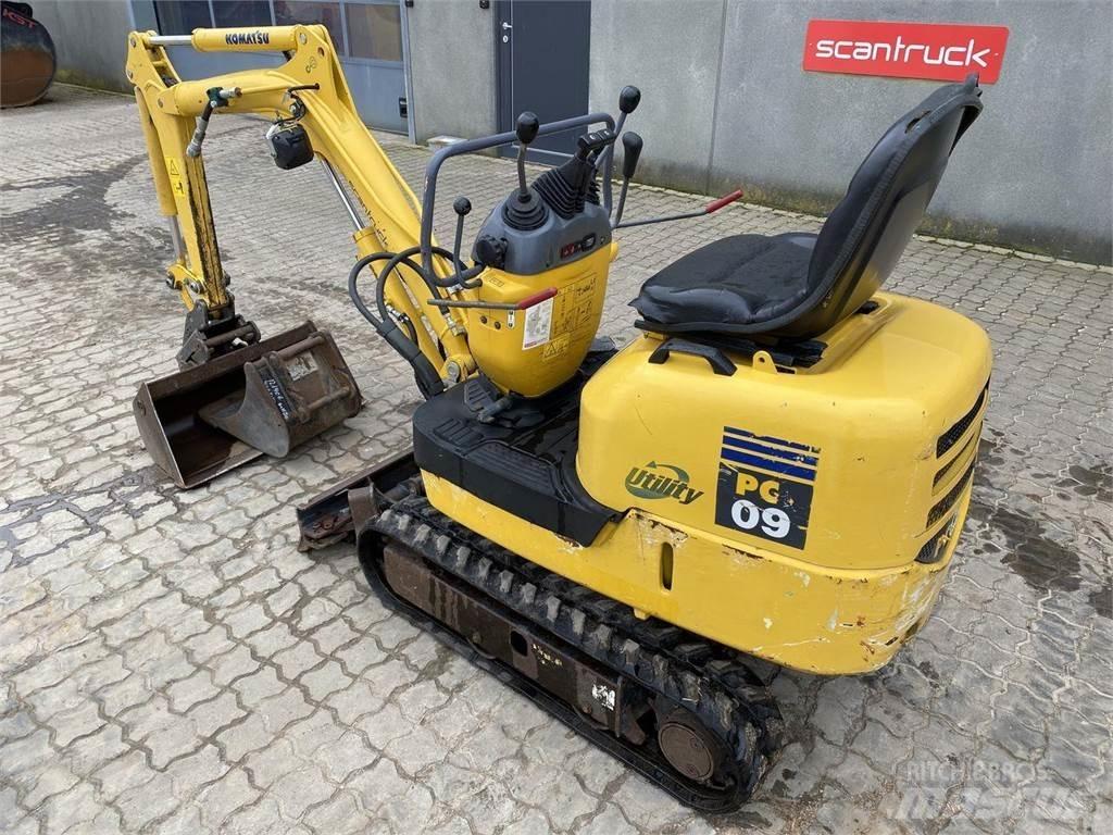 Komatsu PC09-1 Lastik tekerli ekskavatörler