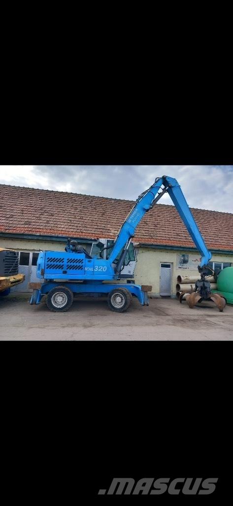 Fuchs MHL 320 Lastik tekerli ekskavatörler
