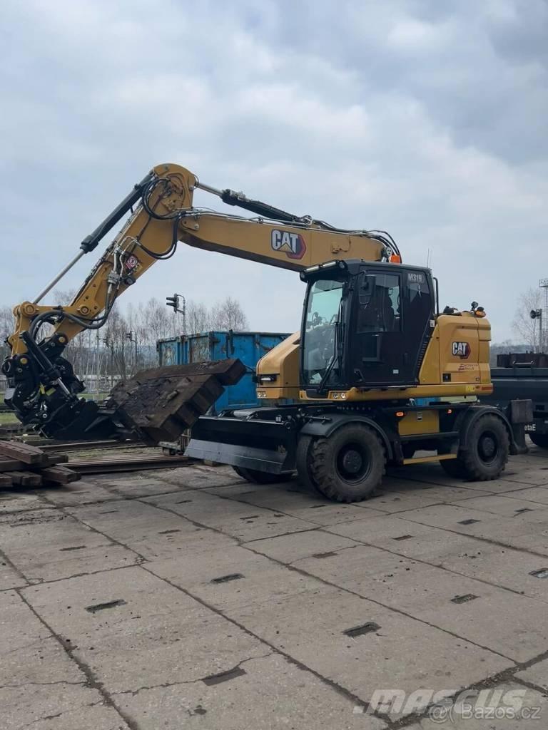 CAT M 319 Lastik tekerli ekskavatörler
