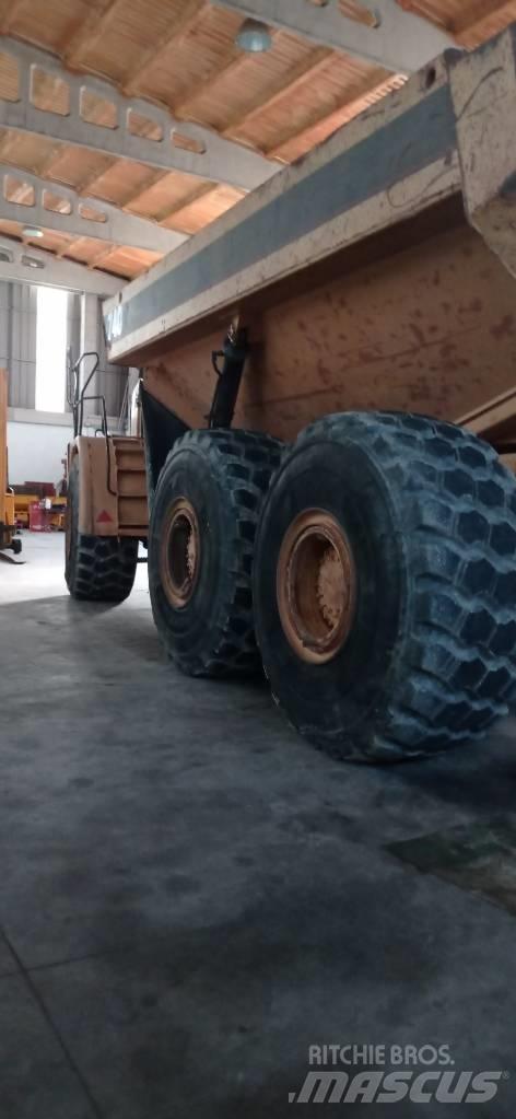 CAT 740 Belden kirma kaya kamyonu