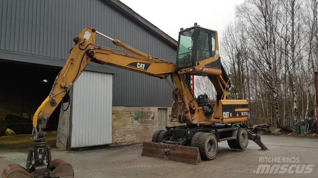 CAT M 318 Atık taşıma araçları