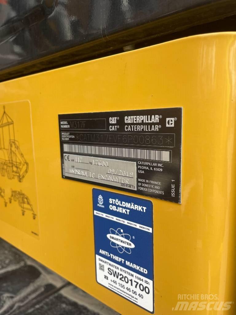 CAT M317F Lastik tekerli ekskavatörler