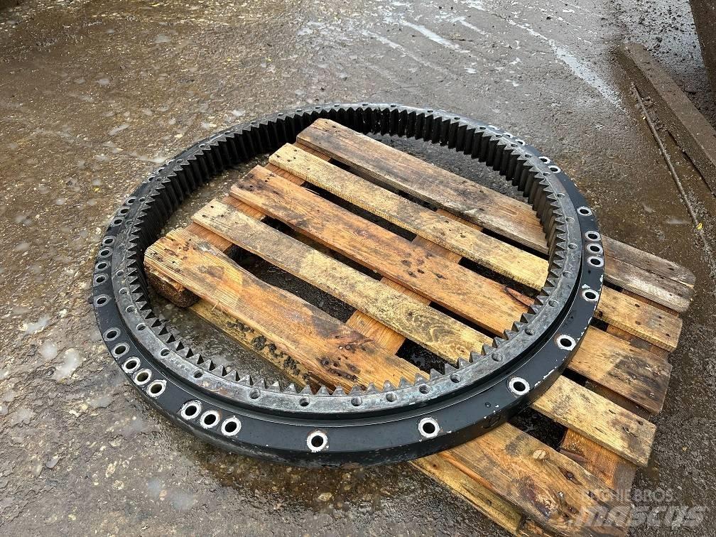 CAT 323 slew ring Akslar