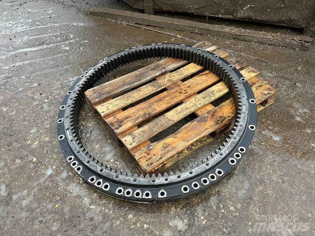CAT 323 slew ring Akslar