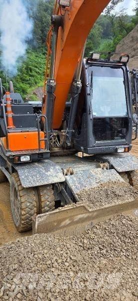 Doosan D 140W-5 Lastik tekerli ekskavatörler