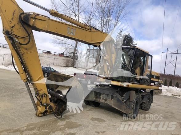 CAT M318 Lastik tekerli ekskavatörler