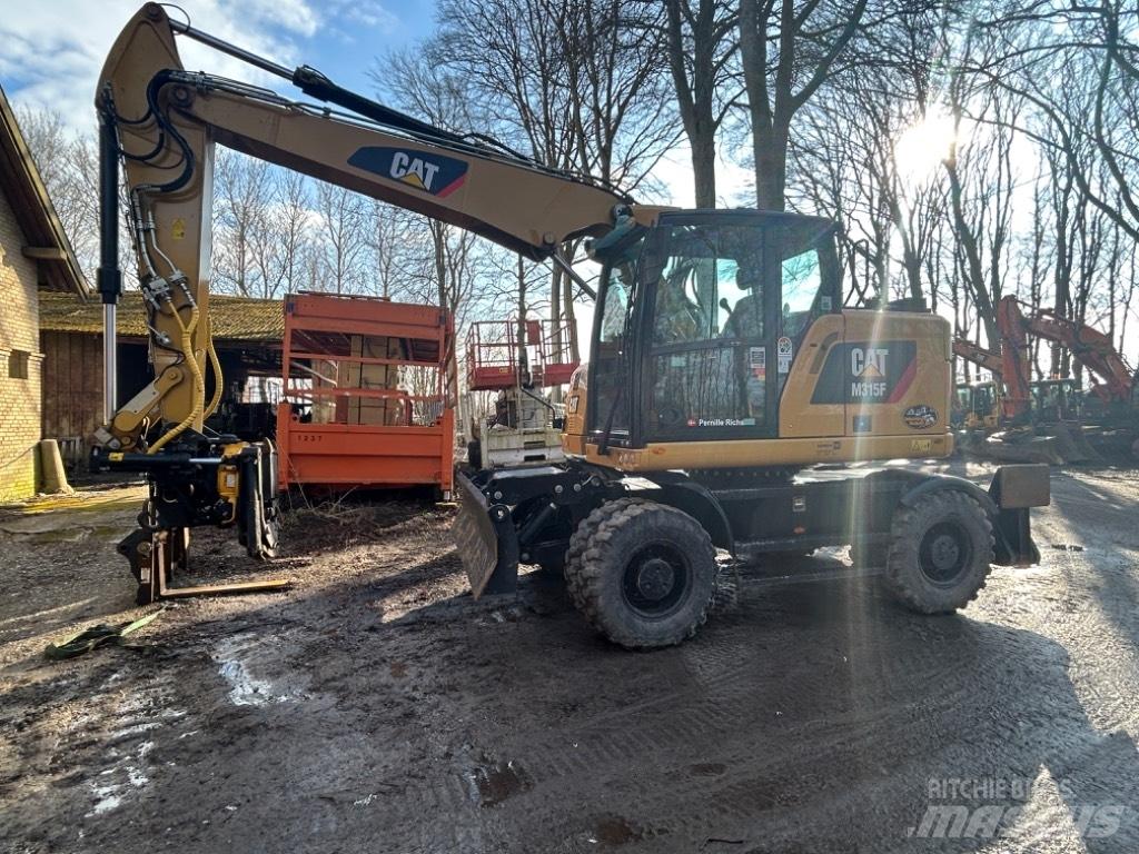CAT M315 Lastik tekerli ekskavatörler